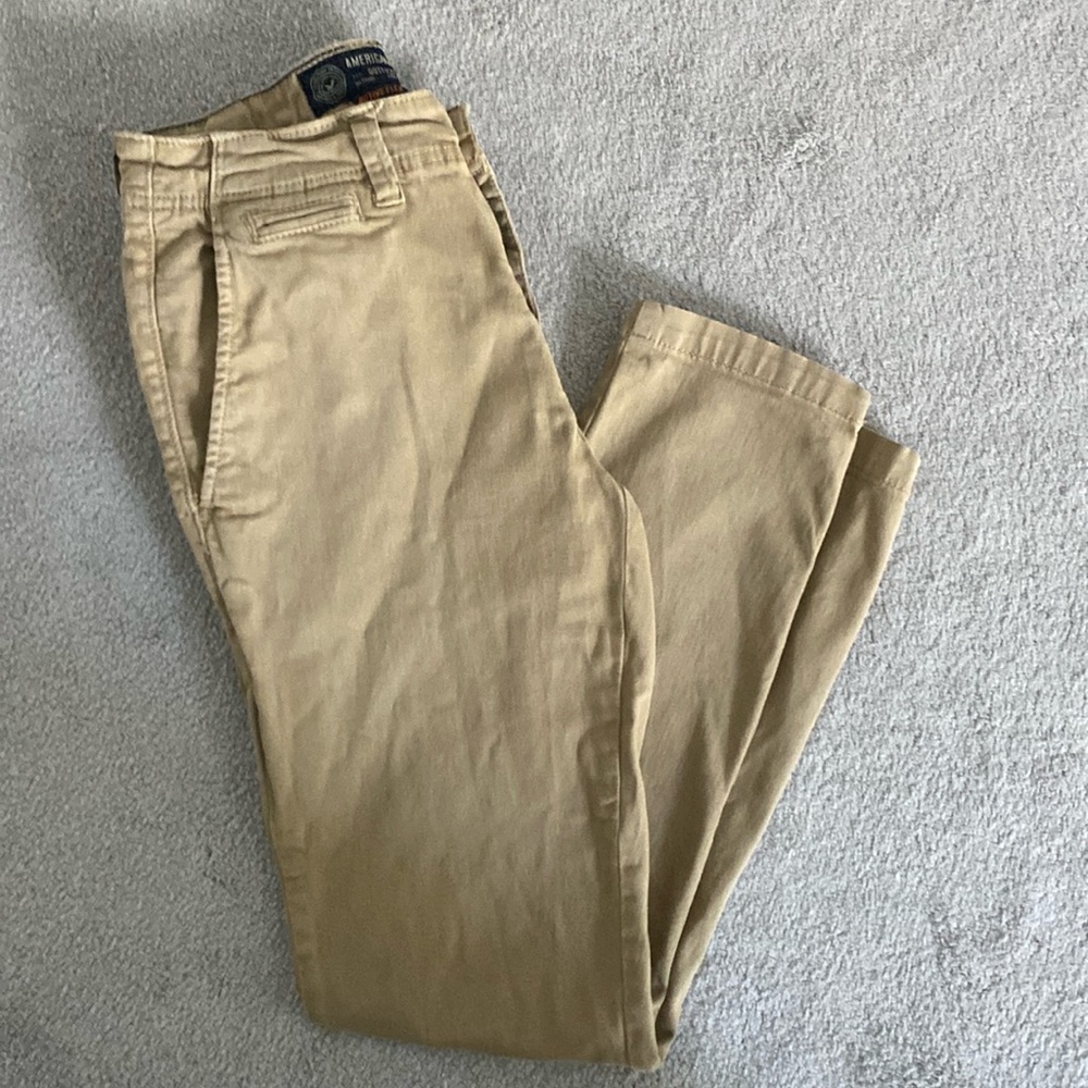 Gently worn khaki pants.  Slim fit